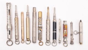 A Waterloo Carpenters pencil holder, together wit a group of eleven various propelling pencils.