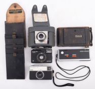 A group of various cameras ,