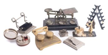 A set of brass and ebony letter scales, together with three various pen stands, etc,