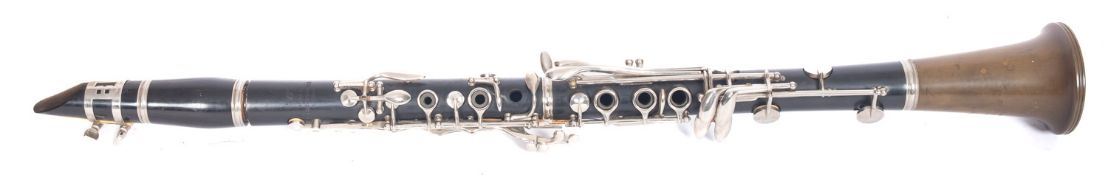 A Boosey & Hawkes '77' clarinet, serial number '154798', 67cm long.