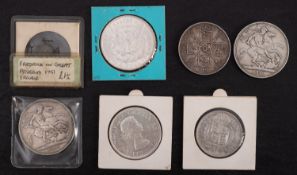 An 1887 double florin, two 1890 crowns, 1887 halfcrown, a 1886 USA dollar, etc.