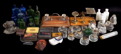 A collection of various glass bottles, various retailers and makers.