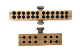 An early 20th century brass three section suppository mould by Maw & Sons, London,