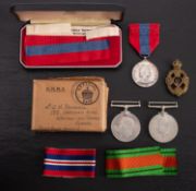An Imperial Service medal to ' John Henry Randell' in case of issue together with a WWII pair and a