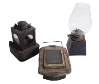 A BR(W) oil hand lamp with original tulip shaped glass on a square base,