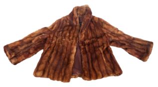 A mid 20th century three quarter length brown fur coat, unsigned,