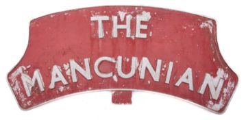 A reproduction cast aluminium locomotive nameplate 'The Mancunian' 36x83cm.
