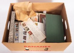 An accumulation of stamps and covers in a box