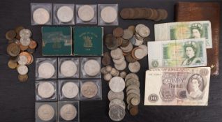 A tin containing two 1951 Festival of Britain coins, five 1953 crowns, Paye £10 note etc.