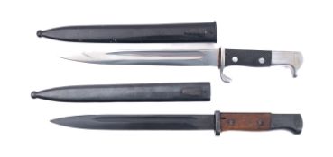 A German Dress bayonet and Spanish 1943 Mauser bayonet,