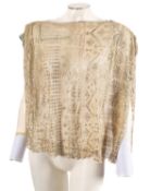 An Egyptian white cotton a gilt metal Assuit shawl, converted to a short sleeve top,