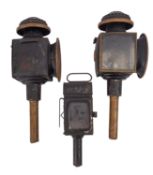 An early 20th century red signal lamp,