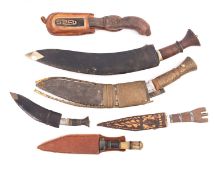 Two Kukris in leather scabbards together with a group of four other various knives (6)