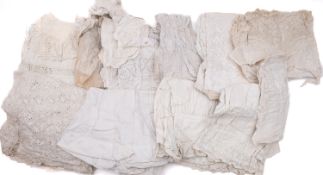 A small collection of white cotton pique dresses.