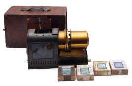 A late 19th/early 20th century brass and tinplate magic lantern,