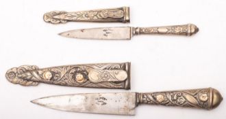 A pair of Argentina 'Alimar' white metal mounted gaucho knives,