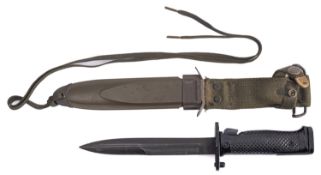 An American USM8A1 bayonet in scabbard.