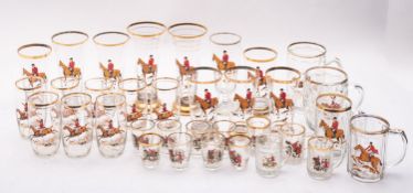 A collection of various hunting theme drinking glasses, each with transfer decoration.