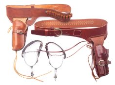 A Triple K Brand brown leather Western style gun belt with holster,