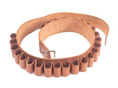 A brown leather 12 bore cartridge belt.