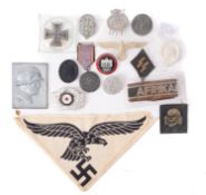 A collection of various German badges and totes, together with a vehicle pennant.