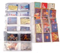 A collection of four sets of Disney (Skybox) cards including 'Cinderella', ' Aladdin' and others.