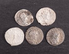 Roman coins. A Antoninanous of Postumus, a Valerian II, a Treb. Gallias and two Gordian III.