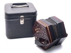 An early 20th century ebony twenty-one key concertina by Lachnel & Co, serial number 190492,