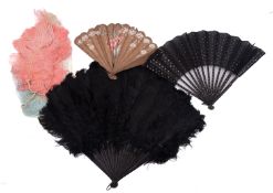 A small collection of various textiles including lace section a brown leather glove case with