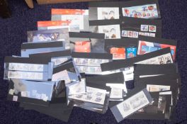 An accumulation of Great British decimal commemorative issues mint on stockcards