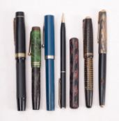 A Parker Vacumatic fountain pen, laminated golden brown, together with a cased Parker 61,