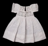 A small group of various whiteware , including three christening gowns, dresses and bonnets etc.