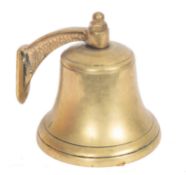 An 8 inch brass ship's bell, unsigned with suspension bracket and clanger.