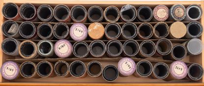 A collection of approximately 96 Indestructible cylinders..