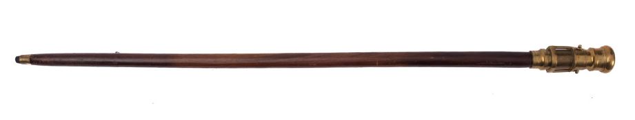 A reproduction brass telescope 'Gadget' stick, 94cm long.
