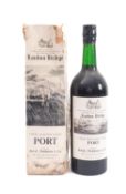 A bottle of London Bridge Tawny Port, bottled by Fells of London in remains of card box.