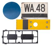 A small yellow and black signal arm, together with a blue spectacle,