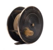 A brass 4 1/12 inch reel with single horn handle in a canvas reel case.