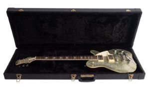 An Aria Pro II M-Series electric guitar, in a silver glitter finish , modified by Mansons Guitars,