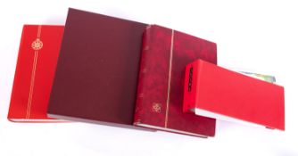 Four albums of Cocos keely stamps.