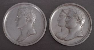 After Betrand Andrieu, two circular pewter medallions, one with a portrait of Napoleon,