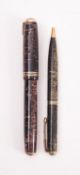 A Parker Vacumatic fountain pen, laminated burgundy pearl with 14k gold nib,
