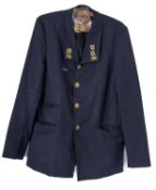 A BR blue cloth jacket together with a collection of ASLEF and Railway related enamel badges.