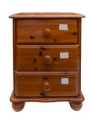 A collection of approximately 74 Indestructible cylinders in a wooden chest