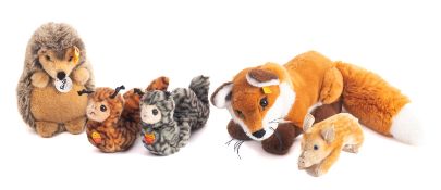 A group of five Steiff animals, including 'Ferdy', 'Joggi', two 'Cosy Fluppy', and a piglet.