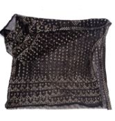 An Egyptian black cotton Assuit shawl with white metal geometric decoration 68 x 208cm