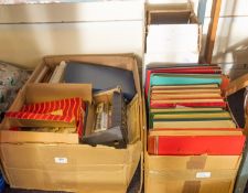 An accumulation of stamps and covers in stock books and loose contained in three boxes with GB from