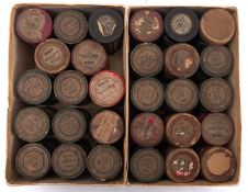 A collection of cased wax phonograph cylinders,