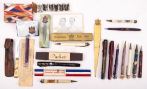A collection of Royal Commemorative fountain pens ,propelling pencils and related items,