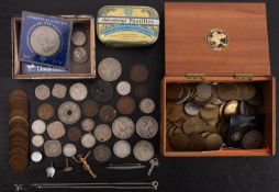 A group of coins, including a quantity of Spade Guinea 1790 gaming tokens with other coins,